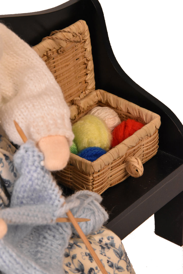 Grandmother Knitting On Bench (2000) - Auction
