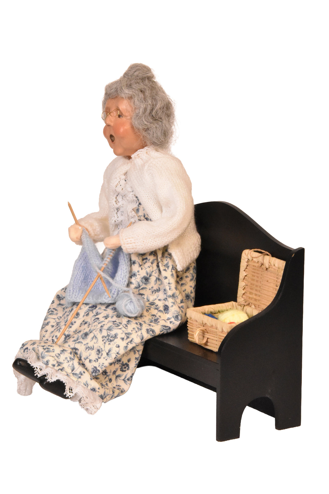 Grandmother Knitting On Bench (2000) - Auction