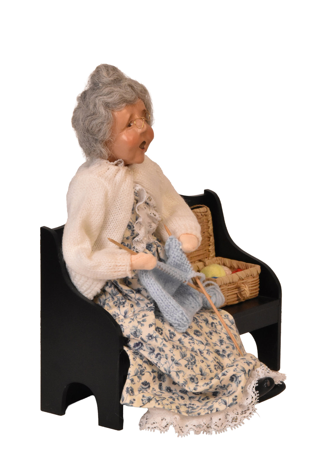 Grandmother Knitting On Bench (2000) - Auction