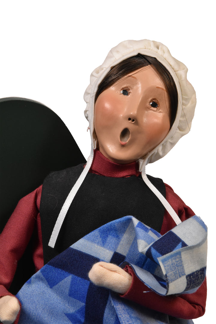 Amish Woman On Bench (2003) - Auction