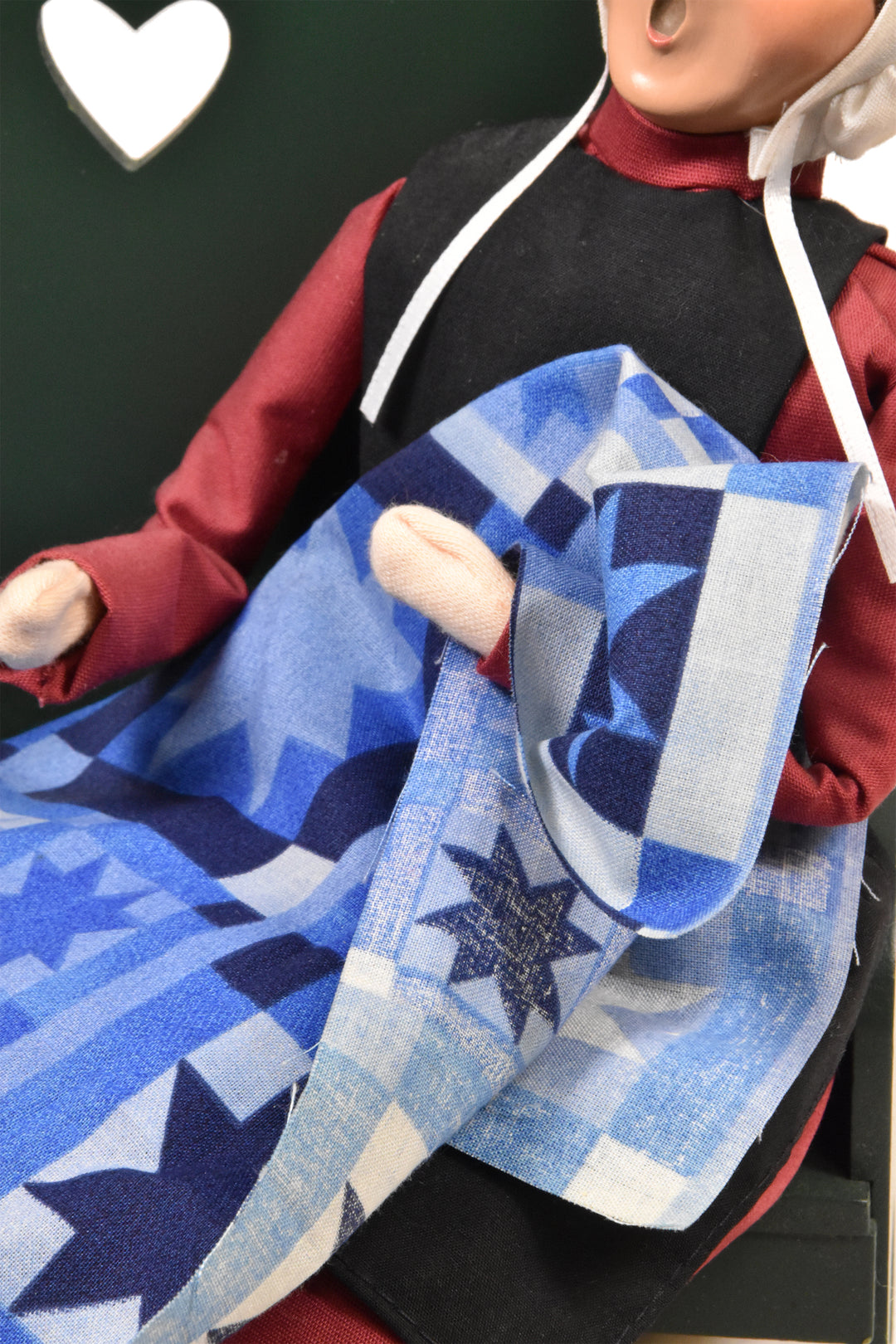 Amish Woman On Bench (2003) - Auction