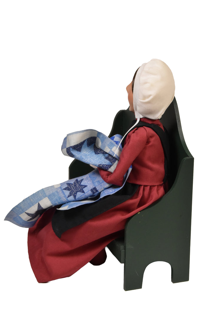 Amish Woman On Bench (2003) - Auction