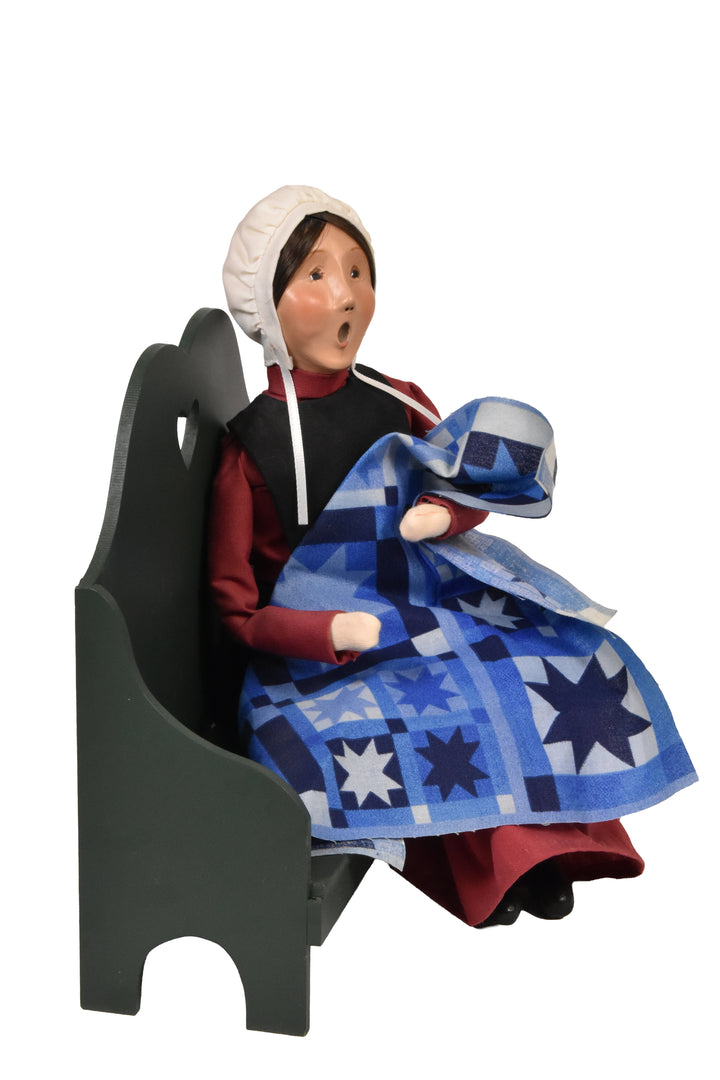 Amish Woman On Bench (2003) - Auction