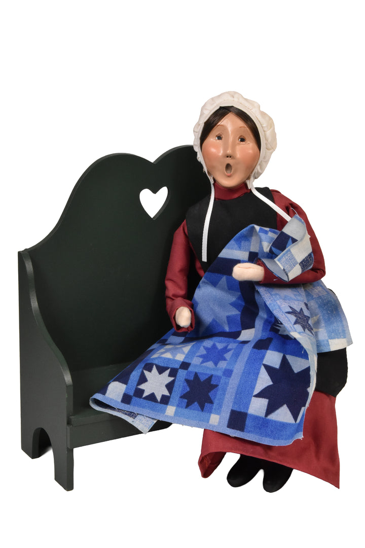 Amish Woman On Bench (2003) - Auction