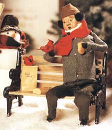 1997  Man Feeding Birds on Bench