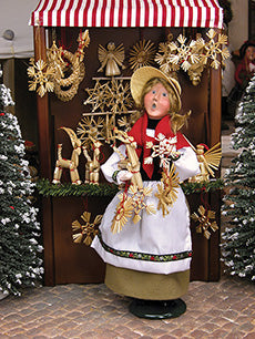 2012  Woman Selling Straw Ornaments